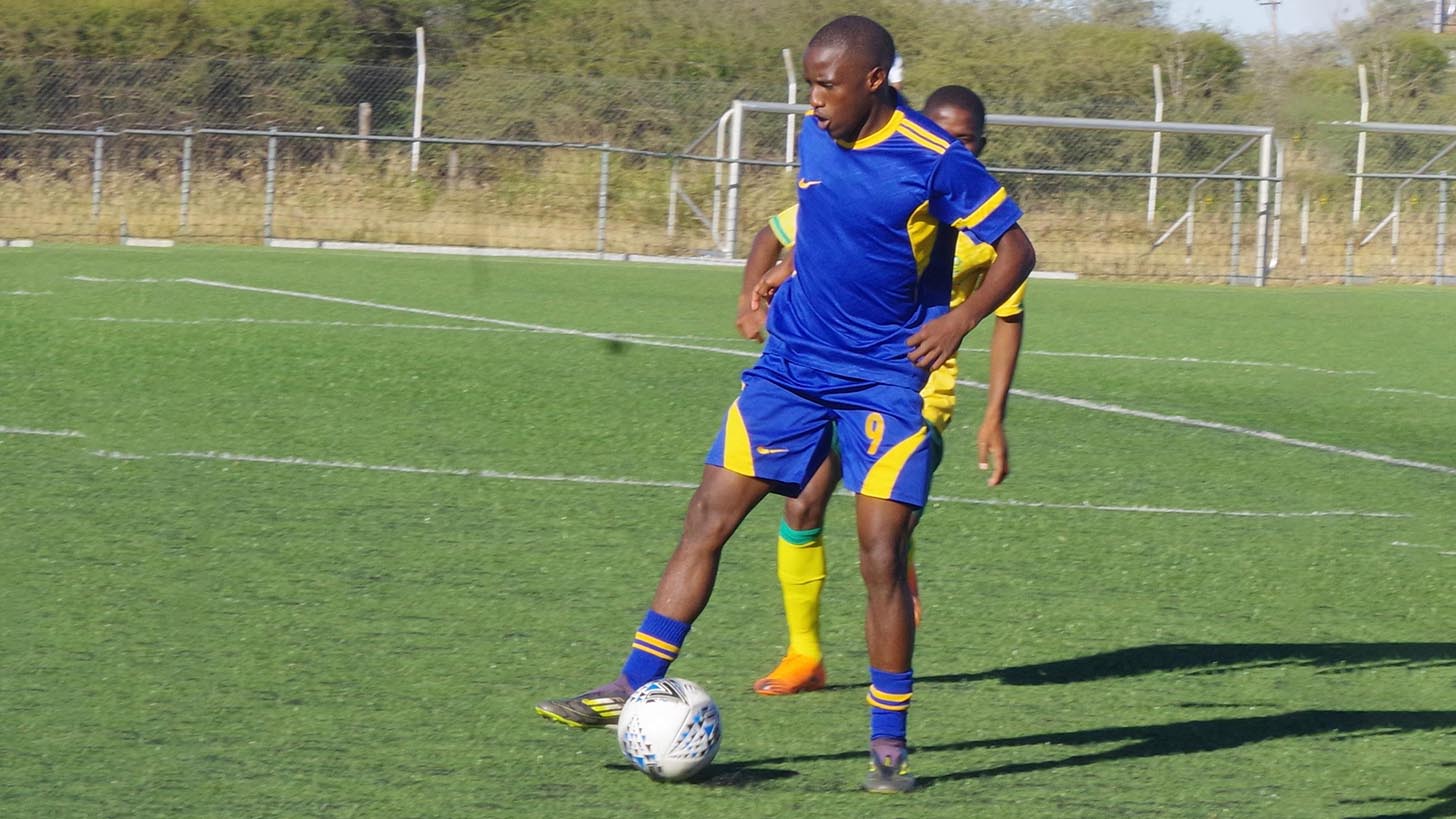 Eswatini’s Kwanele Shongwe controls the ball while under pressure from South African player.Eswatini lost 2-0 to South Africa during the men soccer CUCSA Games.(Pic:Sanele Jele)
